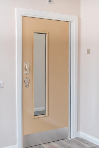 paint grade timber doorset with vision panel and anti-ligature hardware