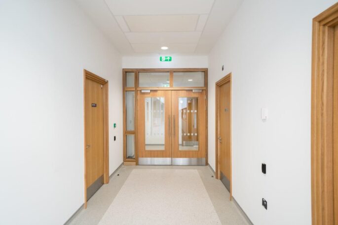 Timber corridor door with integrated hardware_Glazed panels_vision panels
