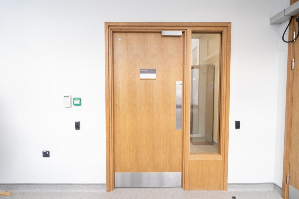 Timber office door_access control_magnetic locking_adjacent timber framed screen