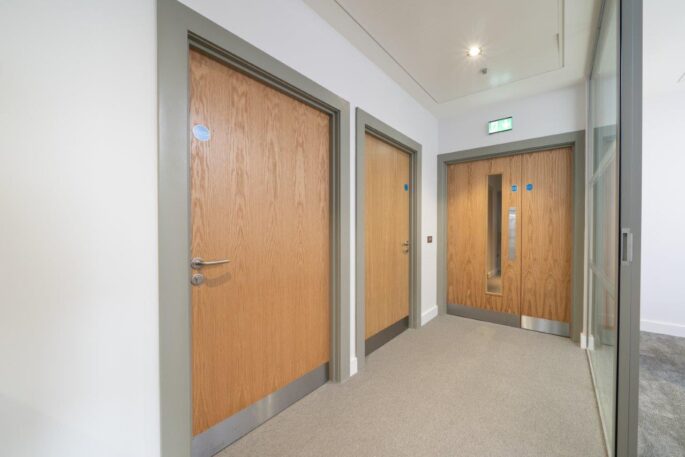 Solid timber acoustic fire rated door with integrated hardware_corridor doors_integrated access control_office environment