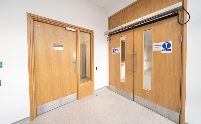 Automated timber doors_corridor doors_healthcare_education_office door with glazed panel_access controlled