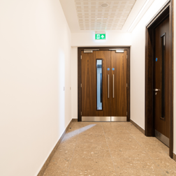 Corridor door_timber door leaf and a half_vision panel_stainlesss steel hardware_commercial office building_sports facility