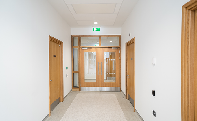 Timber corridor door with integrated hardware_Glazed panels_vision panels