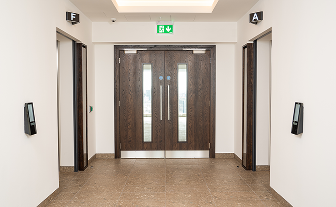 Walnut timber doors_fire doors_access controlled office doors_corridor doors_lift lobby doors_vision panels_integrated ironmongery_commercial office building