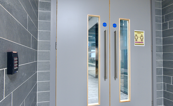 close up of double doors with vision panels